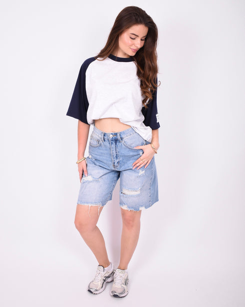 ripped stretch jort vintage blue