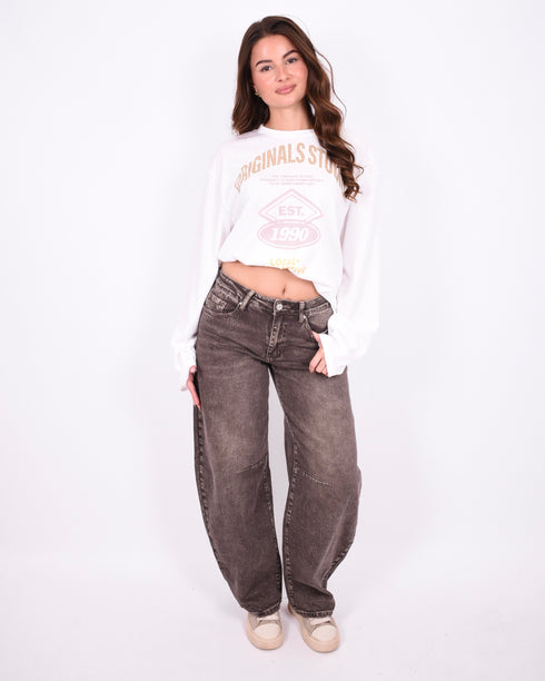 brown washed barrel stretch jeans
