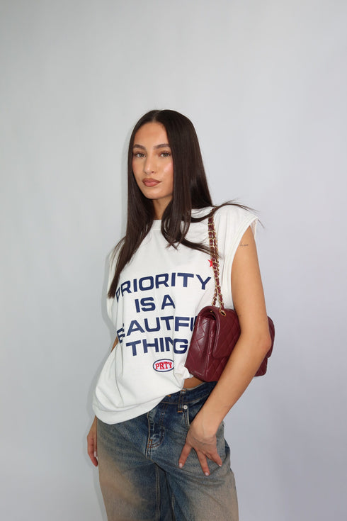 priority sleeveless tee white