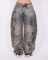 Distressed vintage barrel stretch jeans