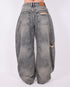 Distressed vintage barrel stretch jeans