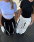 stripe pleated pants black