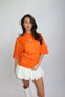 Priority monogram snatched tee orange