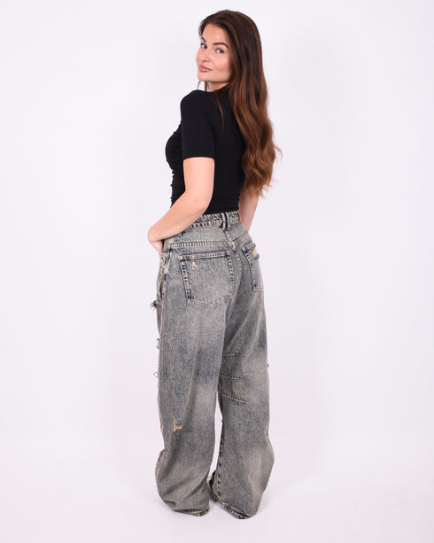 Distressed vintage barrel stretch jeans