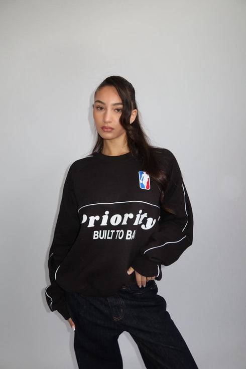 priority built to ball sweater black