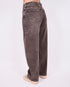brown washed barrel stretch jeans