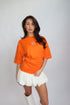 Priority monogram snatched tee orange